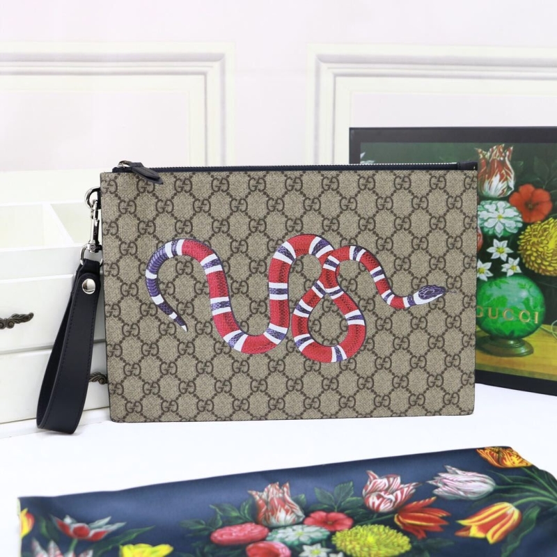 G*u*i clutch bags